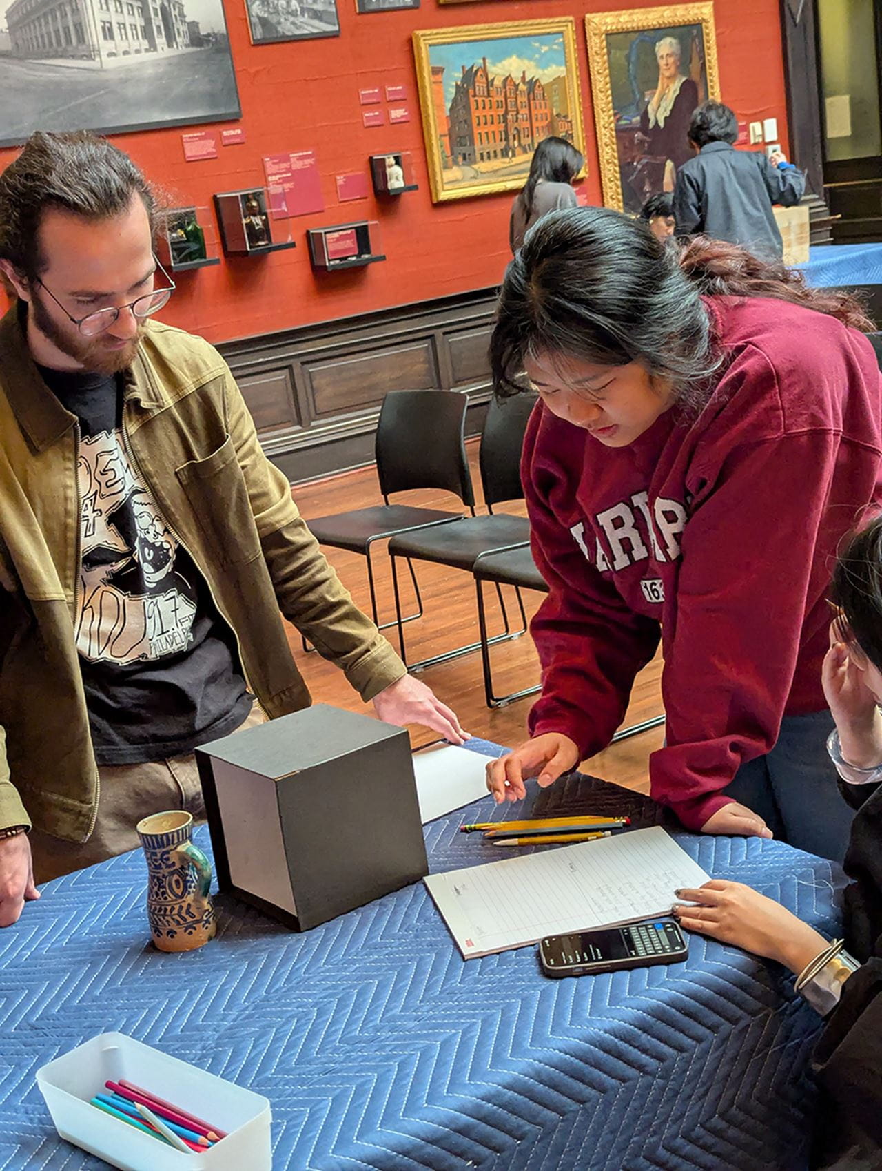 Westphal students Will Lazar, a music industry major, and Monyvathana Ear, a graphic design major, during an exercise for the undergraduate class.