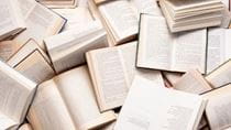 A pile of open books