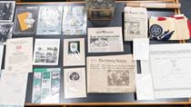 Photograph of objects found in the Kelly Hall Time Capsule.