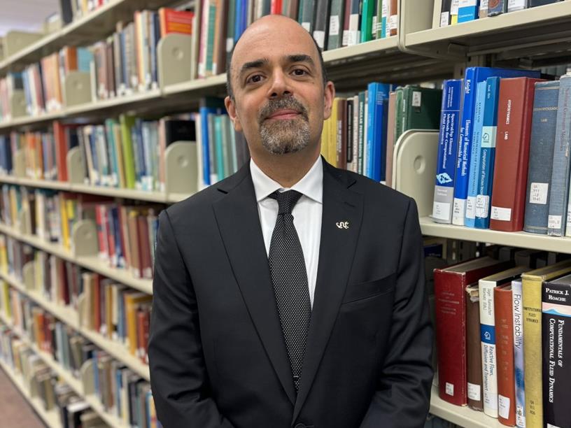 Pedro Raposo in Hagerty Library stacks, 2026