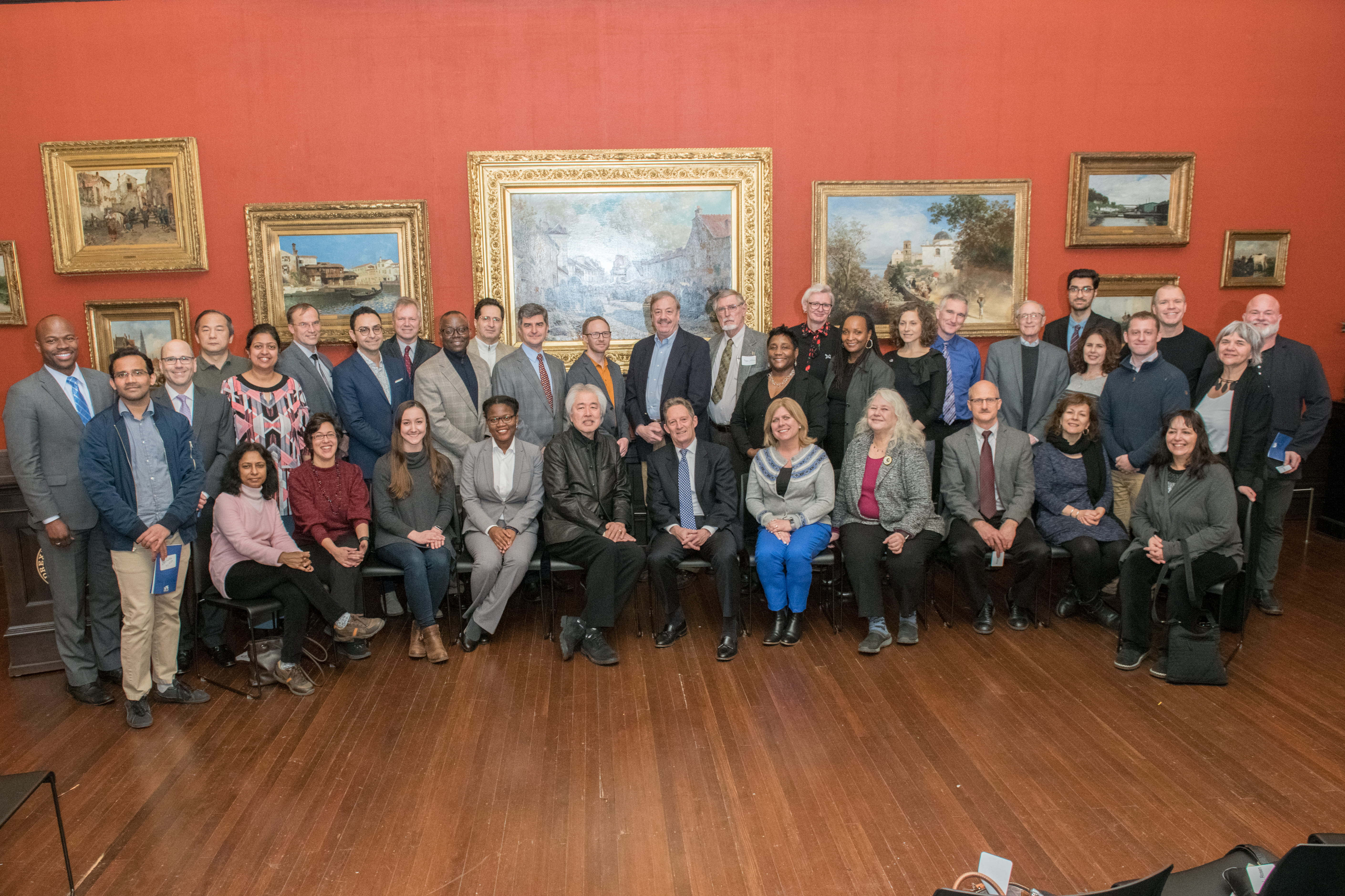 A large group of Drexel faculty, staff and students pose for a photograph in the AJ Drexel Picture Gallery 