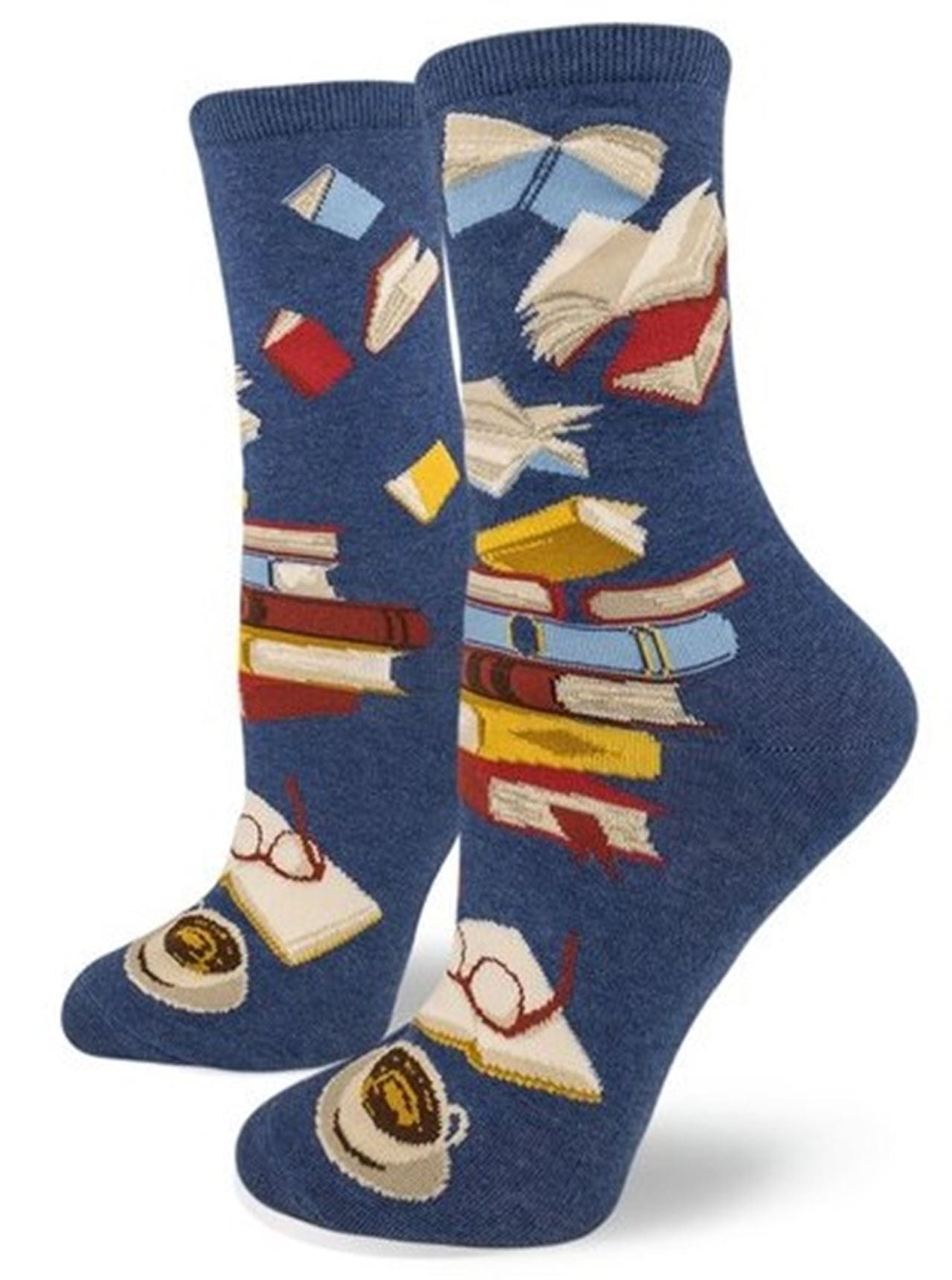 a pair of socks with books and a teacup on them